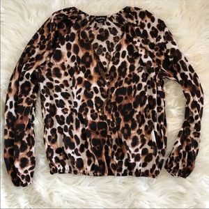 IN SEARCH OF this Bebe shirt.